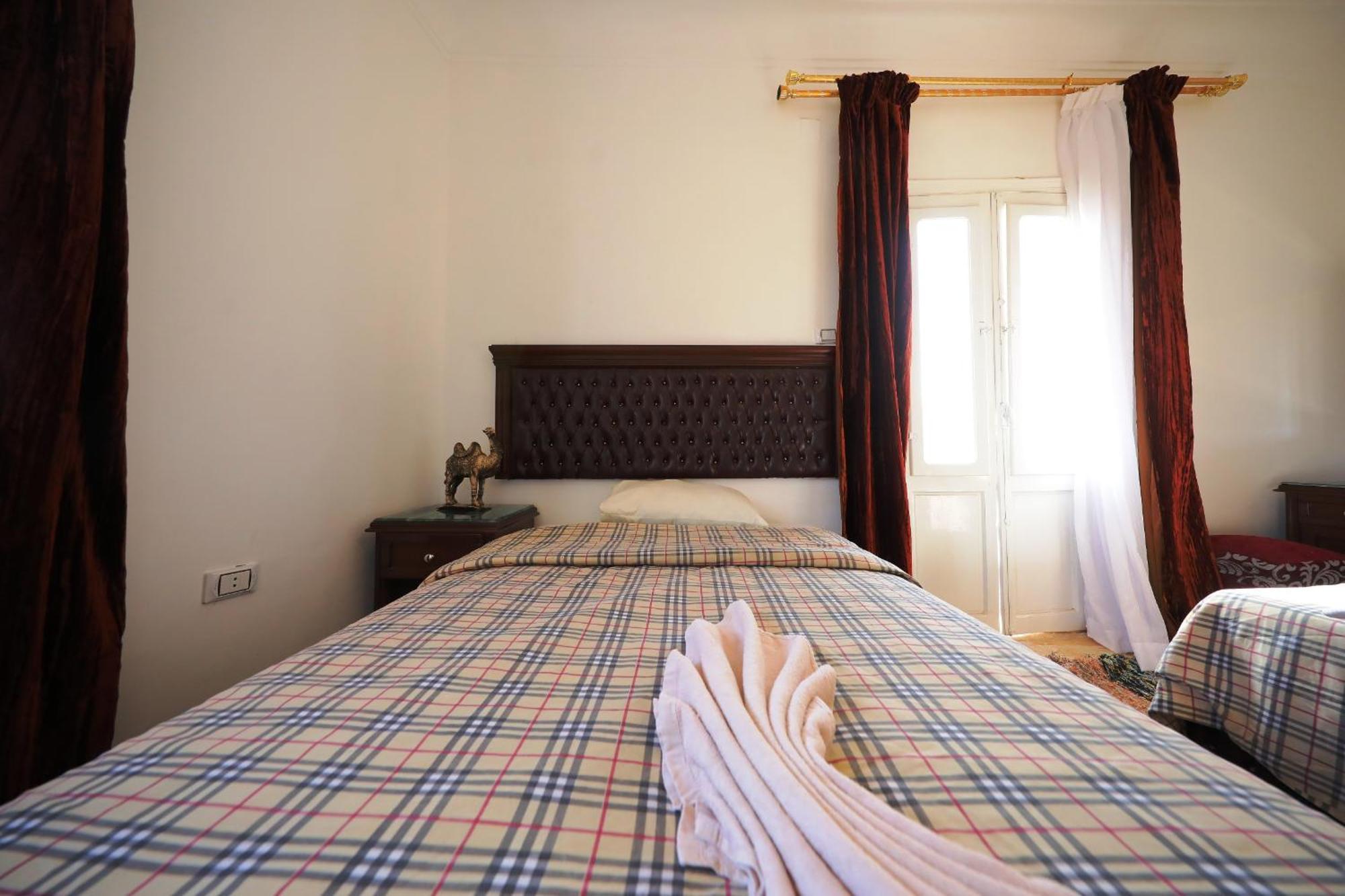 Pyramids Loft Guesthouse カイロ 部屋 写真